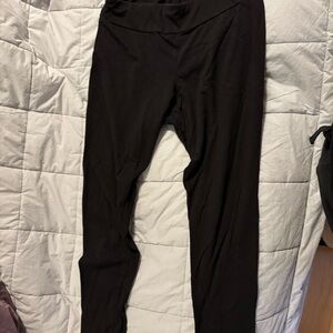 Black high rise time and true leggings. New with tags, size large (12-14).